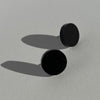 A pair of 15mm round shape Matte Black stud earring made from lasercut acrylic and fitted with a hypoallergenic stainless steel post.