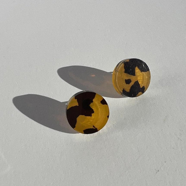 A pair of 15mm round shape tortoise shell stud earring made from lasercut acrylic and fitted with a hypoallergenic stainless steel post.