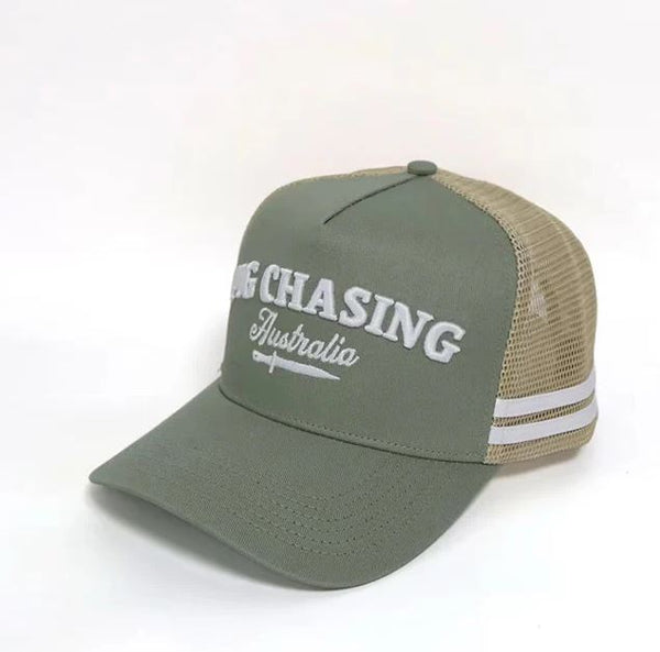 Pig Chasing Australia Cursive Trucker Cap in Green / Tan