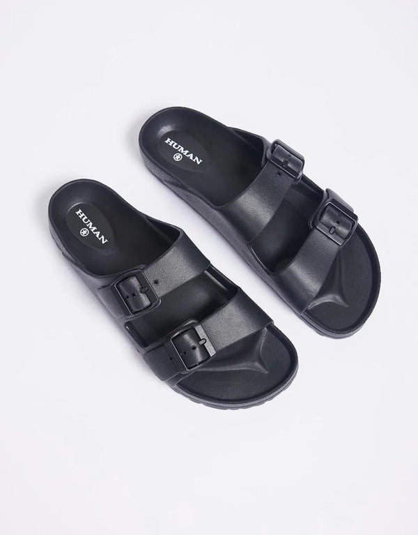 enjoy effortless wear with the slip-on silhouette and adjustability via the tonal buckle