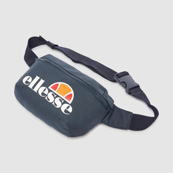 Ellesse Rosca Cross Body Bag. Features adjustable body strap, zip closure, secure clasp fastening. Finished with the Ellesse large logo. Available at My Harley and Rose