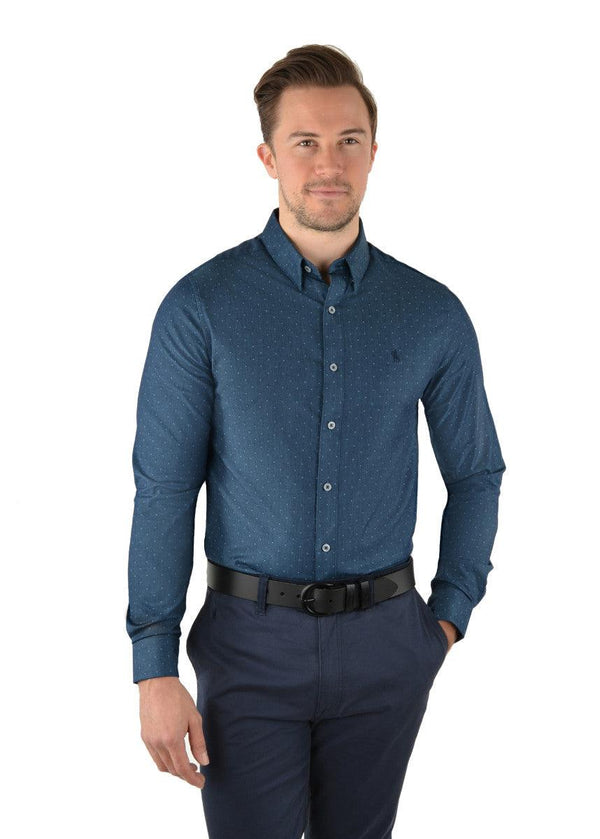 Features: Tailored fit style with dobby texture, stretch for comfort and movement, contrast chambray facing on inside collar stand, internal neck stripe taping, concealed collar peak buttons, removable collar stays, horseman embroidery on chest.