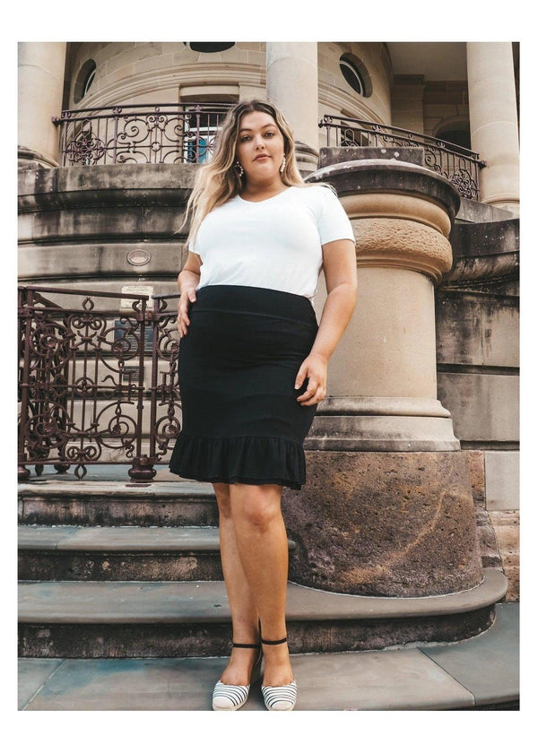 The Katy Frill Skirt Midi is a luxe style made with our silky smooth and ultra soft Bamboo fabric! The fully lined style features our signature wide, stretch, ultra comfortable waist band with a double tiered frill at the hem for some extra glam! Available at Harley and Rose